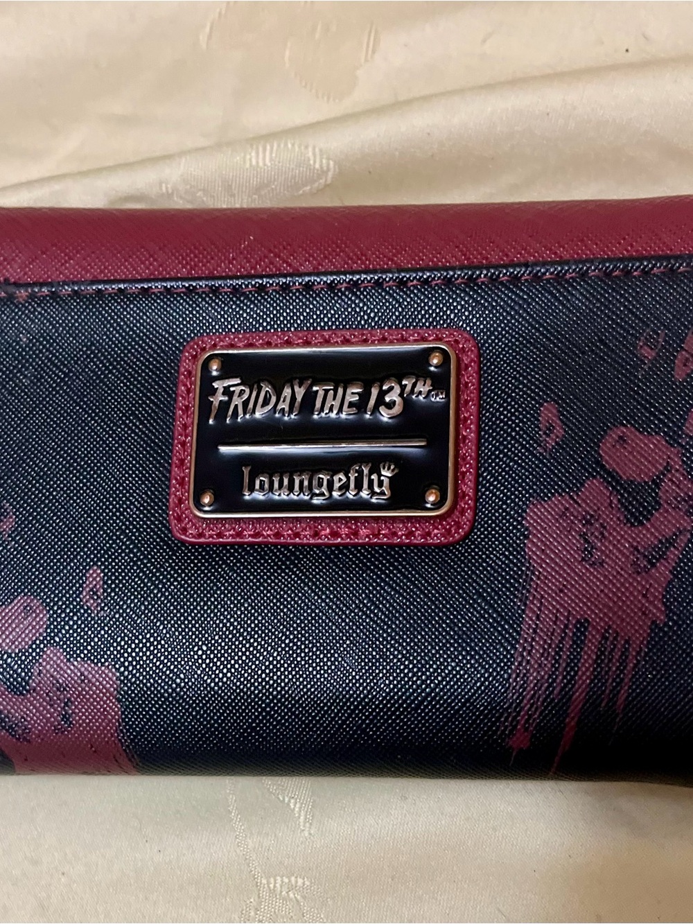 Loungefly Friday the 13th wallet 
Red and black 
New without tags